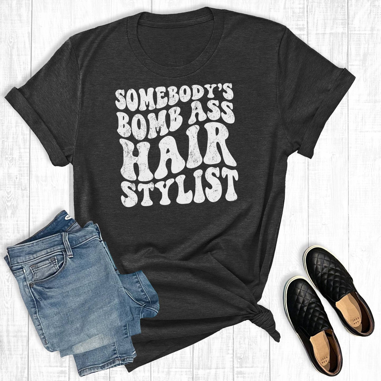 Somebody's Bomb Ass Hair Stylist Graphic Tee