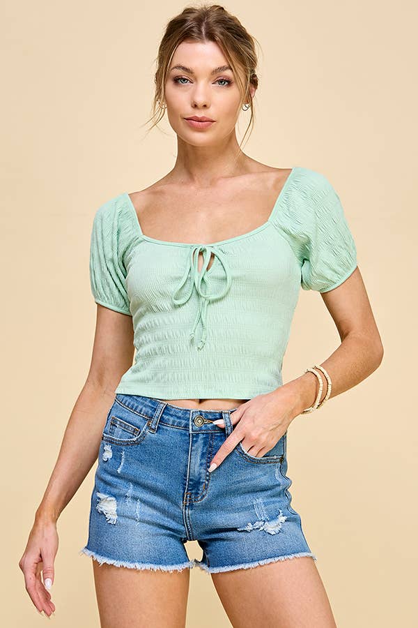 KNIT FRONT WITH TIE MID RISE CROP TOP