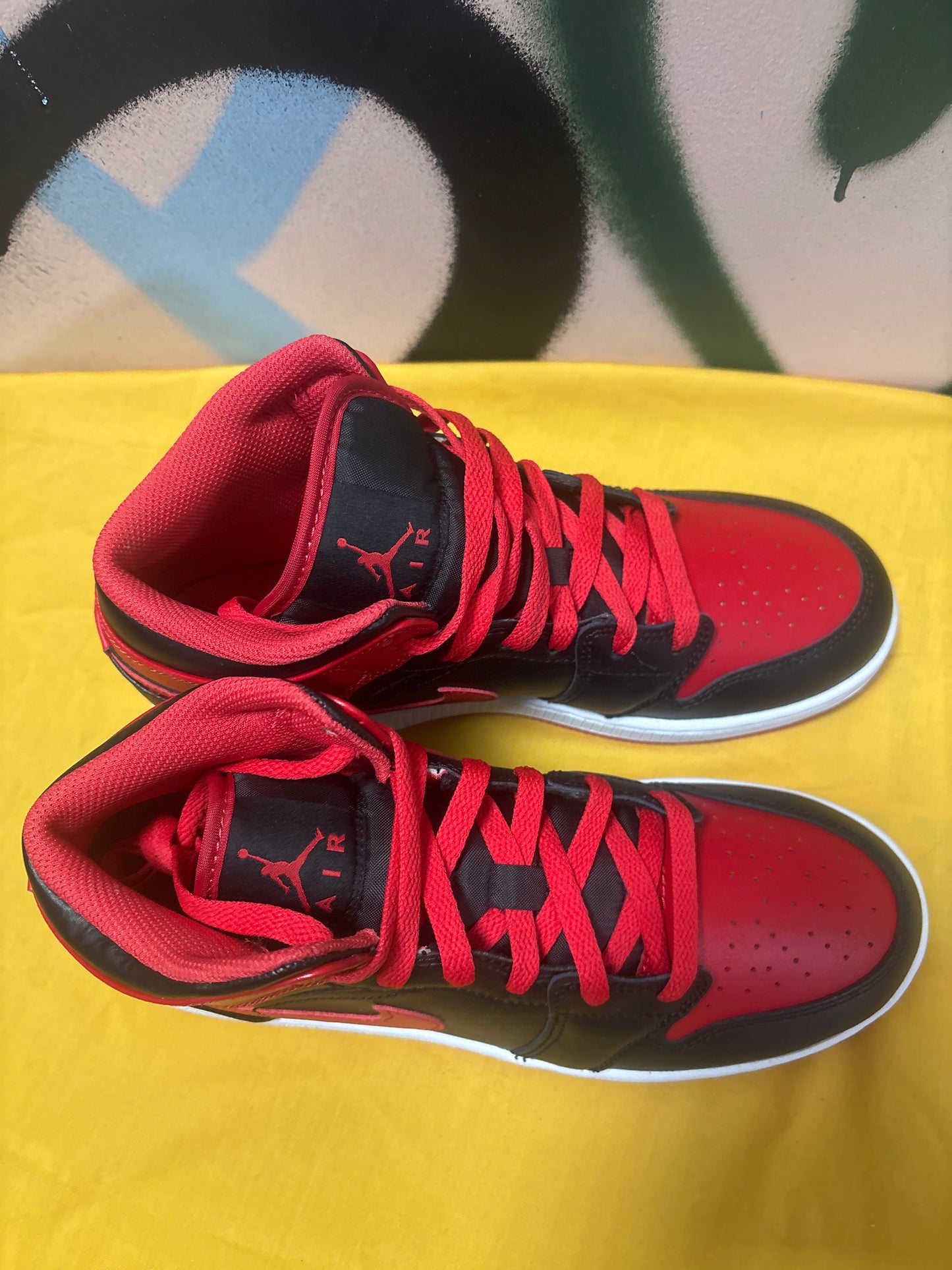 Nike Air Jordan 1 Mid "Alternate Bred" sneakers in a black, fire red, and white colorway Size 7 youth **NEW IN BOX**